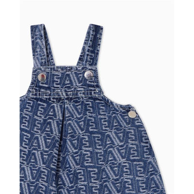 Denim dress for baby girls featuring shoulder straps and a repeated logo pattern in blue.