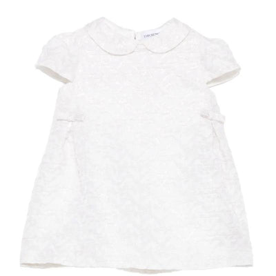Pink baby girl dress by Armani with bows, featuring short sleeves and a rounded collar.