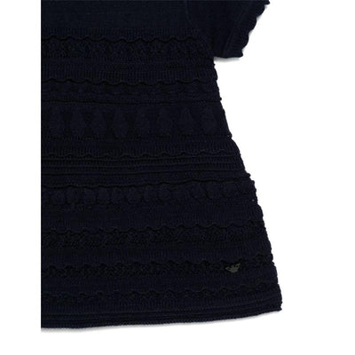 Navy short sleeve ruffle dress for baby girls, featuring textured patterns and a small logo detail at the hem.