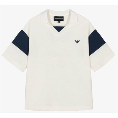 White polo shirt for baby boys featuring navy blue striped sleeves and a small logo on the chest.
