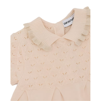 Baby girl dress set in sandshell color featuring a knitted top with a scalloped collar and textured details.