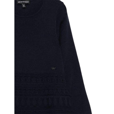 Navy long sleeve ruffle dress for girls by Armani, featuring a textured bottom and subtle logo emblem.