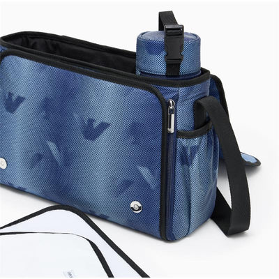 Armani Baby blue changing bag with a zippered compartment, a water bottle holder, and a changing mat.