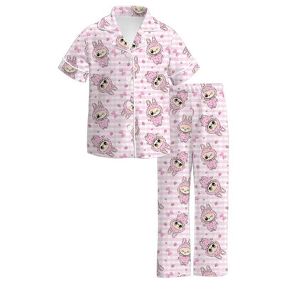 Soft pink pajama set featuring short sleeves and long pants, adorned with Labubu print and hearts.