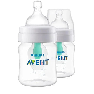 Two clear 4oz Avent anti-colic baby bottles with Airfree vent, featuring a white cap and a green silicone nipple.