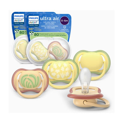 Avent Ultra Air pacifiers for 0-6 months, featuring a tropical pattern with leaves and a breathable design.