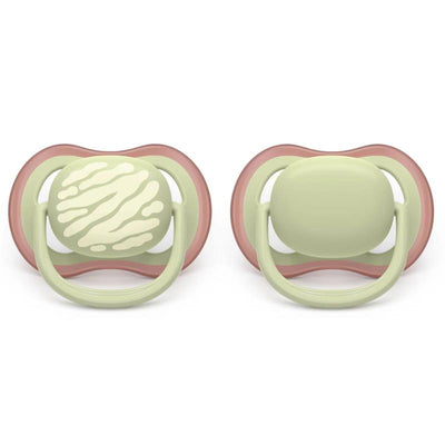 Two Avent Ultra Air pacifiers for ages 18 months and up, featuring a tiger print design and pastel warm green accents.