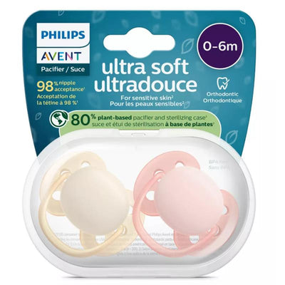 Avent 2-pack ultra soft pacifiers for 0-6 months in sand and soft blossom colors, featuring a sterilizing case and BPA-free material.