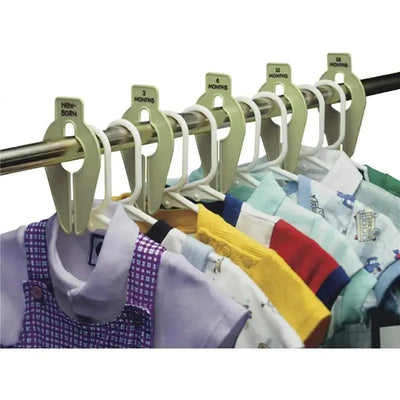 Pink Baby Buddy Size-It Closet Organizers displayed on a rack, labeling infant clothing sizes from newborn to 18 months.