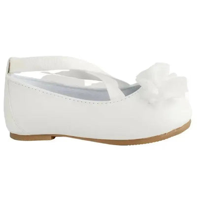 White baby girl shoes with a rounded toe, soft flower embellishment, and crisscross straps for secure fit.