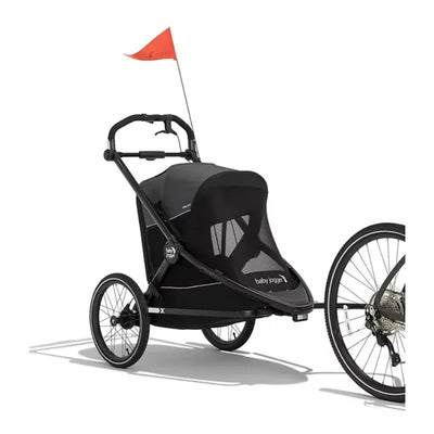 Baby Jogger City Prix Jogger X Bike Trailer in Ambition Black, featuring two large wheels and a safety flag.
