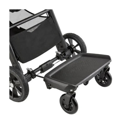 Black Baby Jogger Glider Board attached to a stroller, featuring a textured platform and four small wheels.