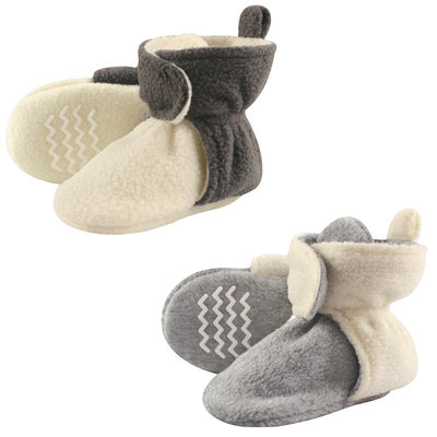 Two-pack of Baby Vision two-tone fleece-lined scooties in cream and gray, featuring soft fabric and non-slip soles.