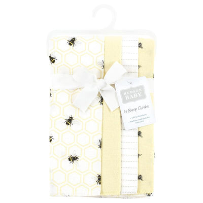 Set of four flannel burp cloths featuring honey bee and honeycomb patterns, soft and machine washable.