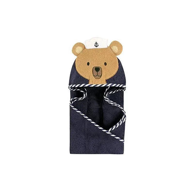 Hooded towel designed for babies, featuring a bear face and sailor hat in navy blue with rope detailing.