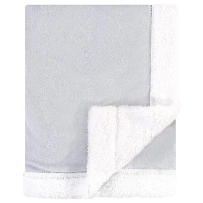 Soft gray baby blanket featuring a fluffy white Sherpa backing, ideal for keeping infants warm and cozy.