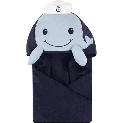 Hooded towel shaped like a smiling whale with a sailor hat, designed for unisex babies.