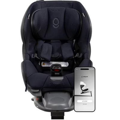 Smart convertible car seat in charcoal grey and midnight blue, next to a smartphone app interface for setup and monitoring.
