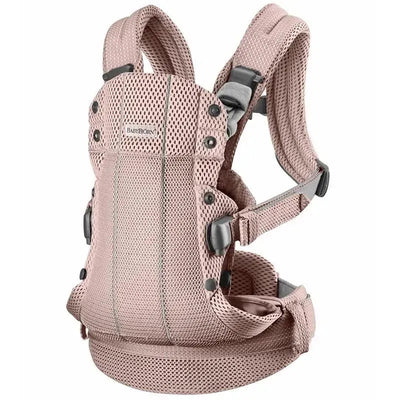 BabyBjorn Baby Carrier Harmony in dusty pink, featuring breathable 3D mesh fabric, adjustable straps, and a compact design.