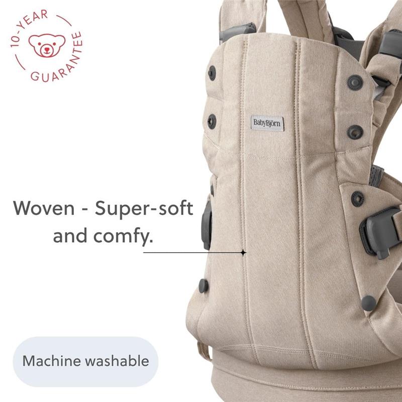 BabyBjörn Baby Carrier Harmony in Light Beige, featuring a soft woven fabric, machine washable, with a 10-year guarantee.