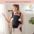 Babybjorn Baby Carrier Mini in black, featuring a mother holding a baby, stylish and ergonomic 3D mesh design, acknowledged as hip healthy.
