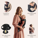 Black Babybjorn Baby Carrier Mini 3D Mesh, designed for newborns, featuring adjustable head support and back straps.