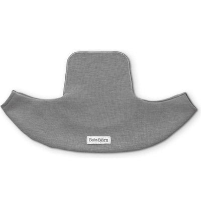 Light gray Babybjorn Bib For Mini made of jersey fabric, featuring a wide design and Babybjorn logo tag.
