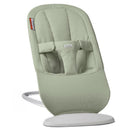 Babybjorn Bouncer Begin in light green fabric, featuring a supportive design and safety harness for infants.