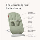Light green Babybjorn Bouncer Begin features a snug design, easy-slide buckles, and quick-zip washable seat, ideal for newborns.