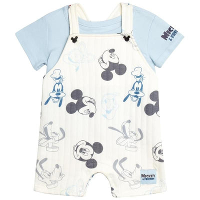 Blue short-sleeved shirt with white Mickey Mouse overall, featuring playful character prints.