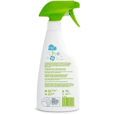 Fragrance-free Babyganics Toy & Highchair Cleaner Spray with a green trigger, featuring cleaning instructions and ingredients text.