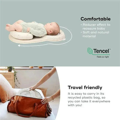 Off-white Babymoov Socosy Floor Pad with a baby lying on it, showcasing its comfort and travel-friendly features.