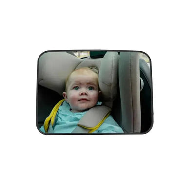 Rear-facing car seat mirror showing a baby with wide eyes, securely buckled in, providing a view for parents.