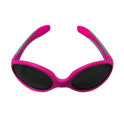 Pink Bbluv solar sunglasses for babies and toddlers, featuring dark lenses and curved frames for eye protection.
