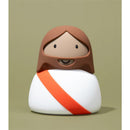 Light-up night light shaped like a cartoonish figure of Jesus with a brown beard and a white robe, featuring a red sash.