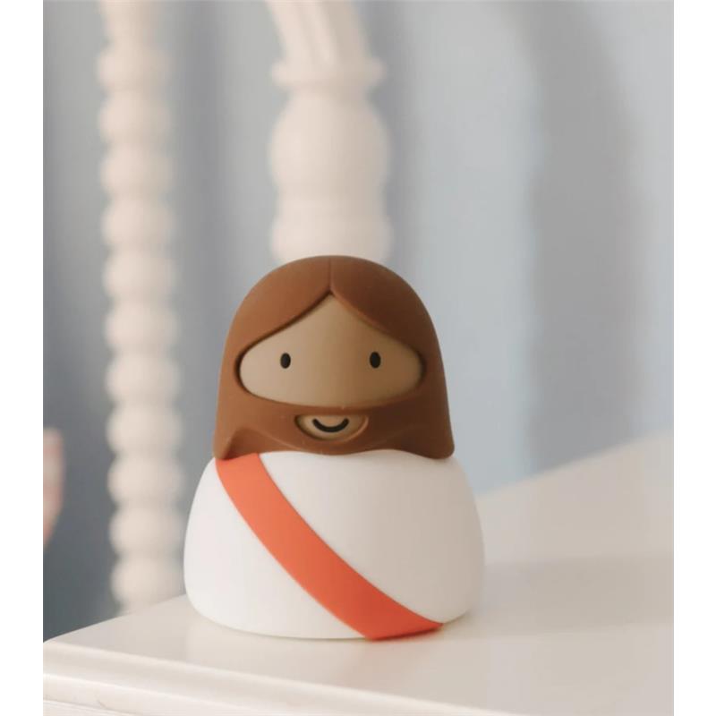 Be A Heart Jesus Night Light featuring a smiling Jesus figure with brown hair, a white robe, and an orange sash.