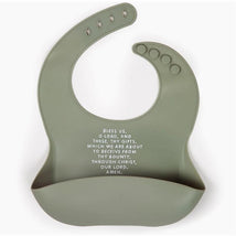 Sage green silicone bib featuring a front pocket and text that reads a meal blessing prayer.