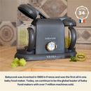 Beaba Babycook Duo 4 in 1 Baby Food Maker in Midnight color, featuring a clear bowl, blending knob, and kiwi slices.