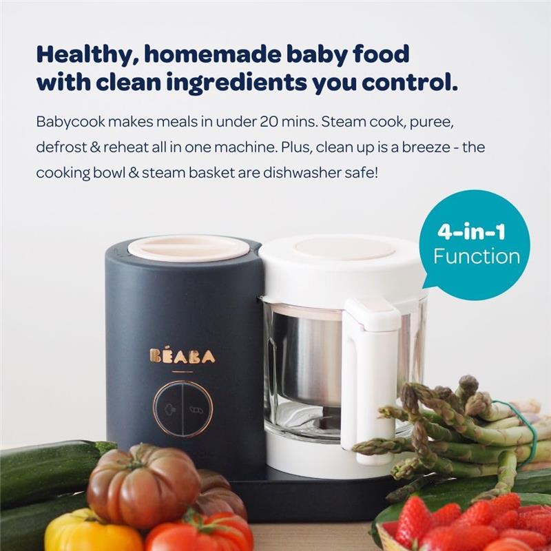 Beaba Babycook Neo baby food maker in dark blue and white, surrounded by fresh vegetables including tomatoes and zucchini, highlights its 4-in-1 function.