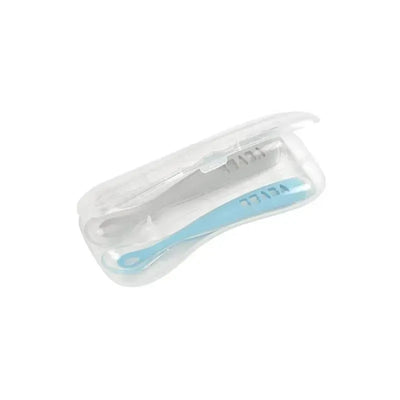 Two silicone spoons in a clear travel case, featuring a blue spoon and a gray spoon, designed for easy transport.