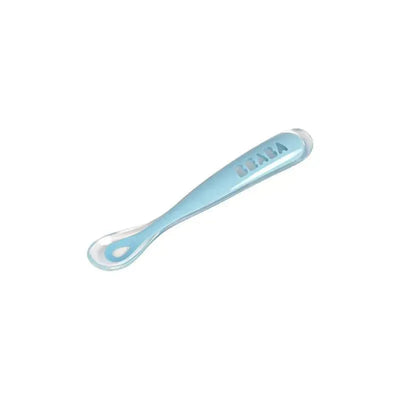 Silicone spoon from the Beaba 2Pk Travel Set, featuring a light blue design suitable for feeding infants.