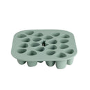 Béaba Silicone Mini Multiportion Tray in sage green, featuring 16 individual portion cups for easy food storage.