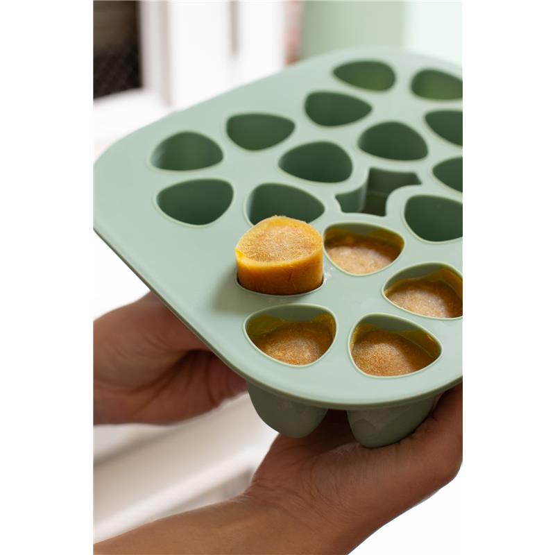 Béaba Silicone Mini Multiportion Tray in sage green holding round portions of pureed food.