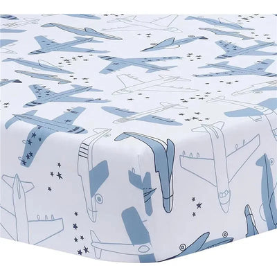 Crib sheet featuring a light blue and white airplane pattern, designed for a playful nursery theme.