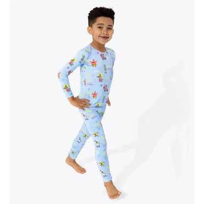 Bamboo kids pajamas featuring Spongebob Squarepants characters, modeled by a smiling child.