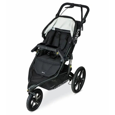 Deluxe snack tray attachment for BOB single jogging stroller, featuring a storage compartment and cup holders.