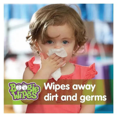 A young child in a pink shirt holds a wipe to her nose, promoting Boogie Wipes that clean dirt and germs.