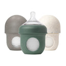 Boon 4 oz Nursh silicone baby bottles in green speckle, gray, and white, featuring a lidded design and flexible bases.