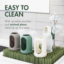 Boon 8 Oz Nursh silicone baby bottles in speckle green and various colors, displayed on a drying rack with reusable pouches.
