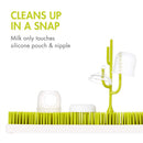 Boon NURSH Silicone Bottle Nipples 3-Pack on a drying rack, featuring bright green bristles and white silicone components.